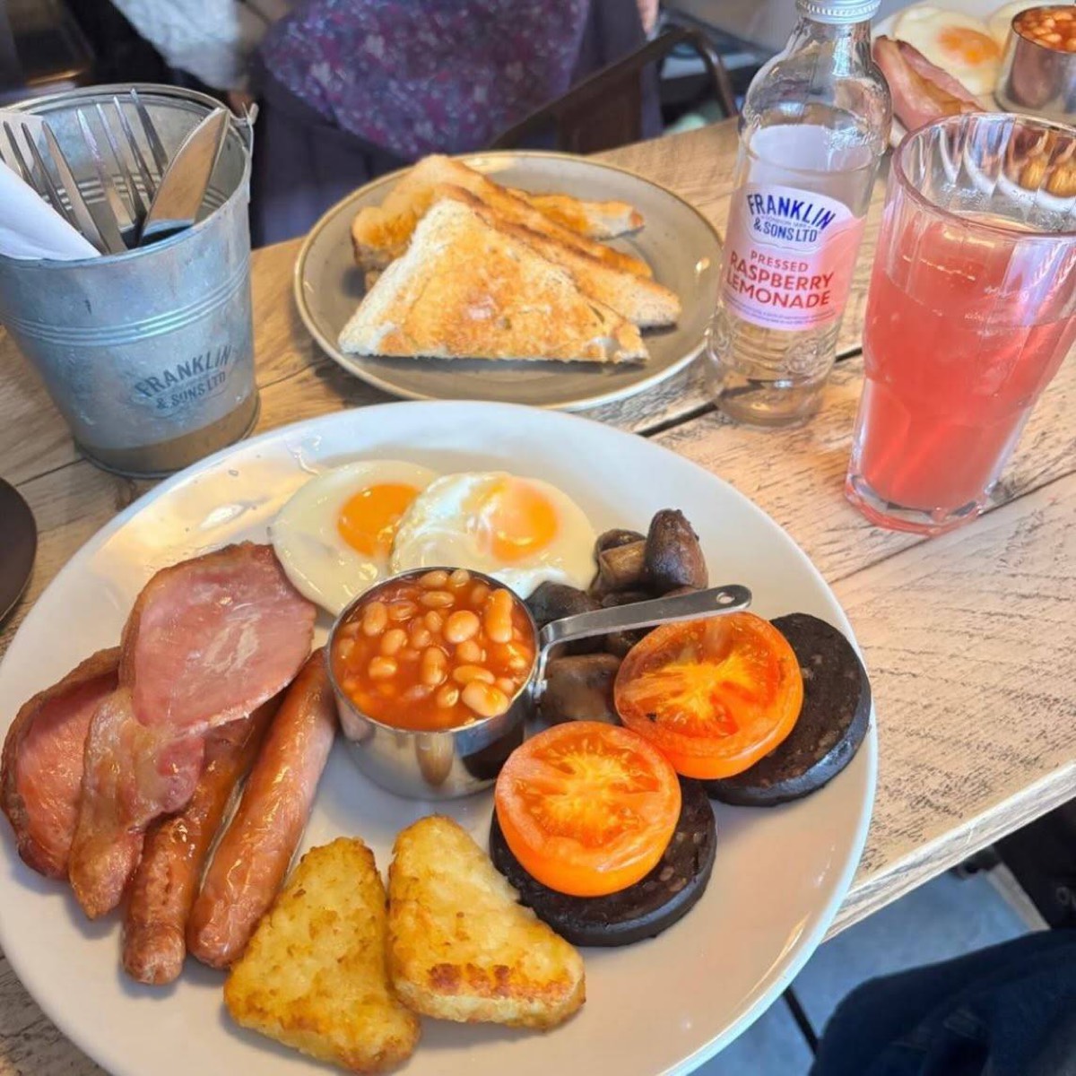 Full English breakfast with hash browns, beans, black pudding and toast